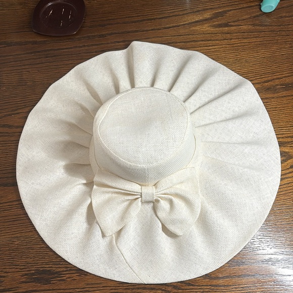 Woven sun hat with bow - Picture 2 of 7